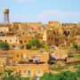 An overview of Mercimekli village, with the church belltower rising above the sprawl in the top-right corner (Alamy)