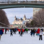 People skate on the ice along the Rideau Canal Skateway in downtown Ottawa